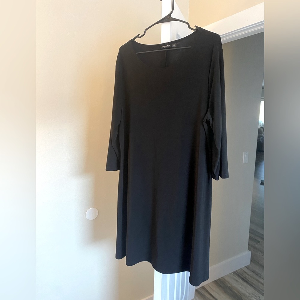 Citiknits black a line knee length dress.